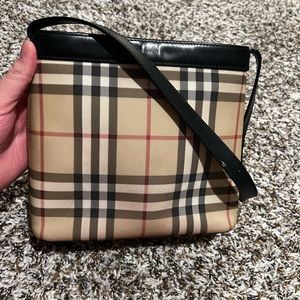 Burberry authentic bag. Very loved. Needs a new home